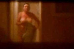 Caught my hot female guest with giant bazookas taking a shower