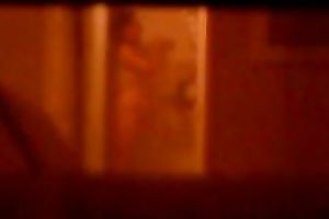 Caught my hot female guest with giant bazookas taking a shower