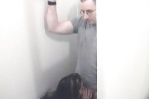 A golden-haired and a brunette hair engulf a nerdy man's weenie indoors