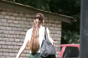 Busty brunette sweetie in Russian Federation pees when a stranger walks by