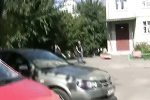 Busty brunette sweetie in Russian Federation pees when a stranger walks by