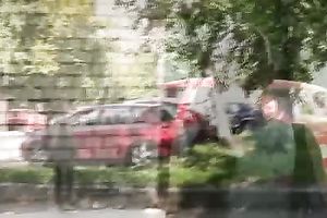 Busty brunette sweetie in Russian Federation pees when a stranger walks by