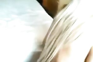 She washed off sticky white cumload on her face in the washroom