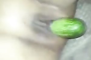Black girlfriend masturbating with a thick cucumber