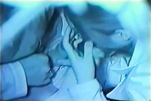 This horny Japanese hussy is giving her paramour a fine oral-service