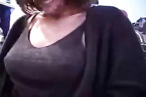 Nasty golden-haired flashes her wobblers and panties in a crowded street