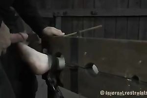 Dissolute bounded playgirl with great wears a head cage