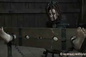 Dissolute bounded playgirl with great wears a head cage