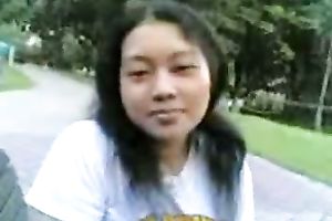 Saucy Asian nympho is showing off her well-matured melons