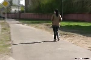Sexy dilettante brunette black cock sluts walks down the street and pees