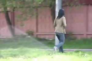 Sexy dilettante brunette black cock sluts walks down the street and pees