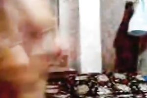 Homemade video with a fellow fingering his breasty lover's twat