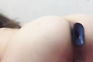 Butt plug in the wazoo gap and shown on webcam closeup