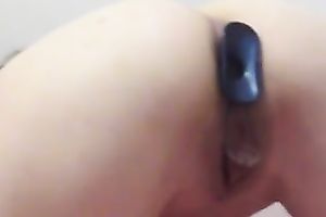 Butt plug in the wazoo gap and shown on webcam closeup