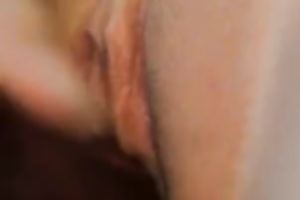 The glamorous red sex toy going in the taut pink pussy of my chick