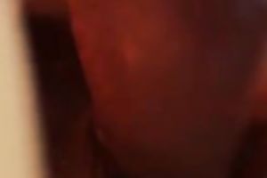 The glamorous red sex toy going in the taut pink pussy of my chick