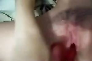 My legal age teenager girlfriend pleases herself with a red rabbit marital-device