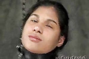 Lovely dark brown slutwife wearing tie is bounded in a basement