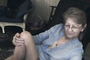 Horny granny on livecam stripteasing and masturbating