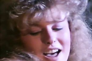 Busty fair-haired woman receives screwed in a car in retro porn scene