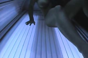 The hottest college slutwife in the solarium topless on hidden web camera