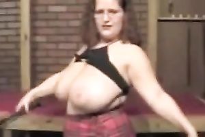 Big bottomed doxy with lovely melons is looking super sexy in her plaid petticoat