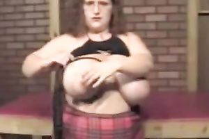 Big bottomed doxy with lovely melons is looking super sexy in her plaid petticoat