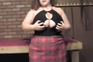 Big bottomed doxy with lovely melons is looking super sexy in her plaid petticoat