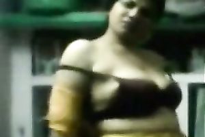 Chubby Indian skank undresses and fingers her snatch indoors