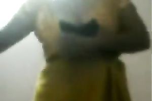 Chubby Indian skank undresses and fingers her snatch indoors