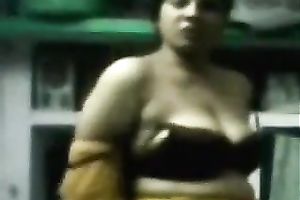 Chubby Indian skank undresses and fingers her snatch indoors