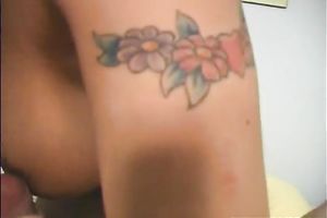 Tattooed black-haired playgirl enjoys working on a rod in POV video