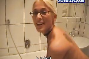Four eyed blondie with wonderful a-hole takes a cold shower