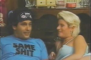 Retro video with a corpulent blond mommy engulfing and riding a schlong