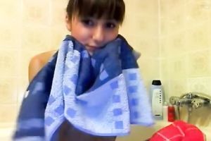 Pretty dark brown likes to take a shower in front of a livecam