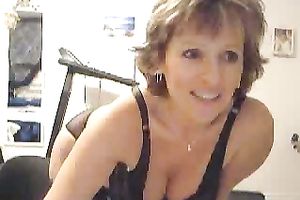 Mature breasty Marie fingers on home cam