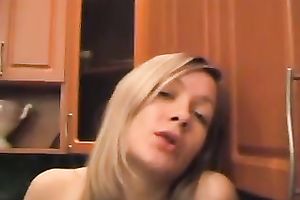 Fond eager and super hawt sweetheart gratifying herself in the kitchen by fingering her vagina