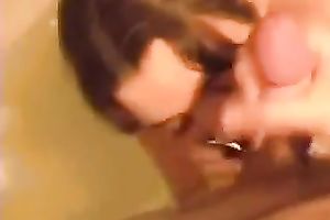 My dark-haired paramour milks my knob dry on her face in the bath