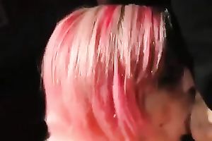 Pink-haired hussy blows and receives cum on her natural milk sacks