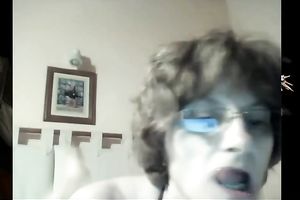 Mature white lady still has seductive cleavage and large boobs