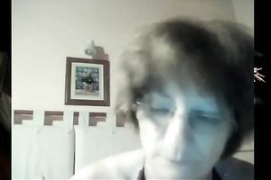 Mature white lady still has seductive cleavage and large boobs