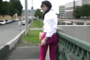Elizabeth pees her legging in the street and takes it off