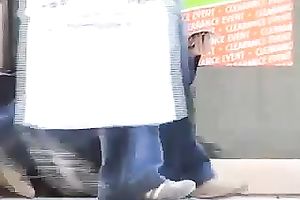 Hot babe flashes her pants for a spycam in a public place