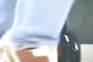 Hot babe flashes her pants for a spycam in a public place