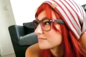 Flirty redhead in glasses knows how to give a fine oral-service