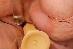 Fat SSBBW older slutty wife bonks herself with large sextoy and fake penis