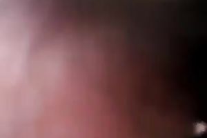 POV scene with a dark brown hussy engulfing my boner in the yard