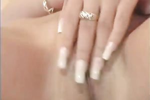 Tasty looking titless blondie pleases her snatch with fingers