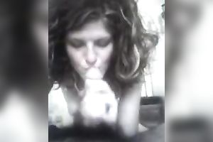 Curly haired skank sucks my swollen knob with all the excitement this babe has