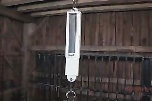 Lustful brunette hair Marina acquires suspended in a basement in BDSM movie scene